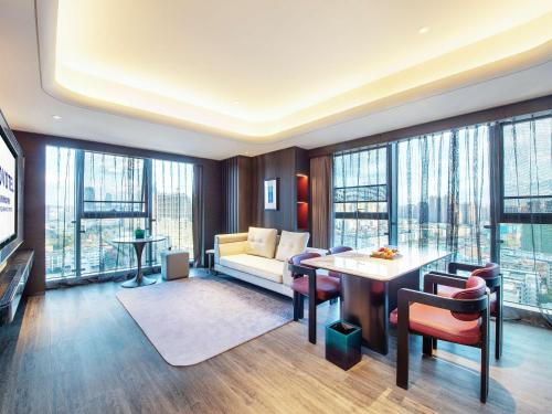 Imagen de la habitación del Hotel Novotel Kunming City Center. Foto 15