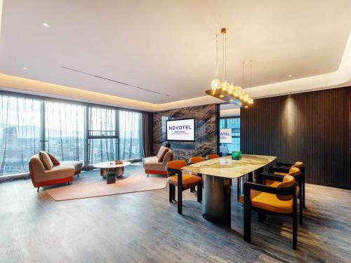 Imagen de la habitación del Hotel Novotel Kunming City Center. Foto 16