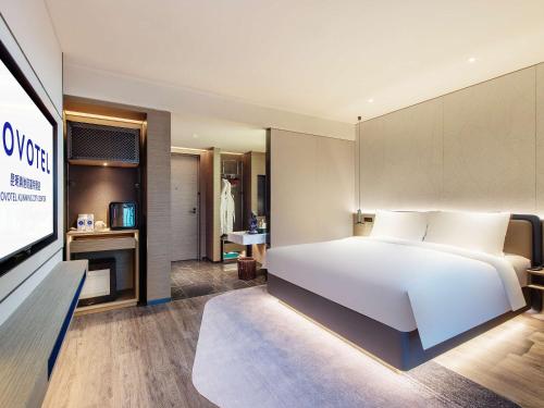 Imagen de la habitación del Hotel Novotel Kunming City Center. Foto 19