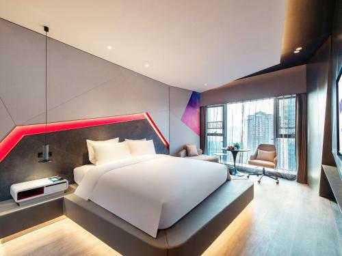Imagen de la habitación del Hotel Novotel Kunming City Center. Foto 20