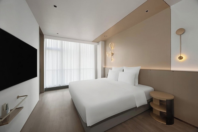 Imagen de la habitación del Hotel Novotel Kunshan East. Foto 2