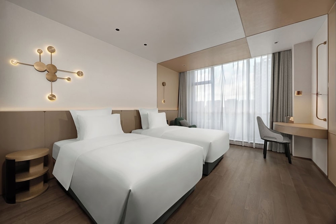 Imagen de la habitación del Hotel Novotel Kunshan East. Foto 10
