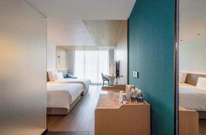 Imagen de la habitación del Hotel Novotel Kunshan East. Foto 11
