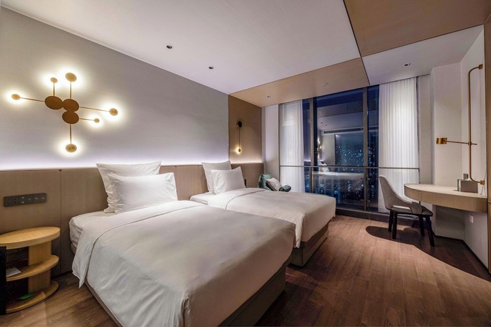 Imagen de la habitación del Hotel Novotel Kunshan East. Foto 12