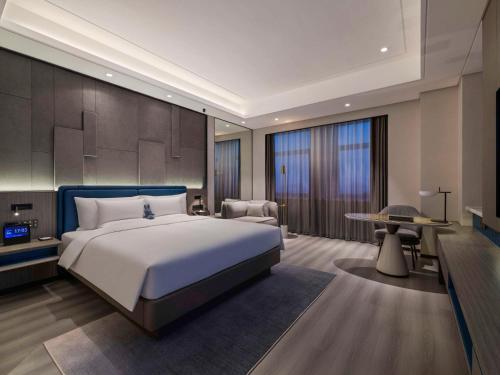 Imagen de la habitación del Hotel Novotel Kunshan Yangcheng Lake. Foto 14