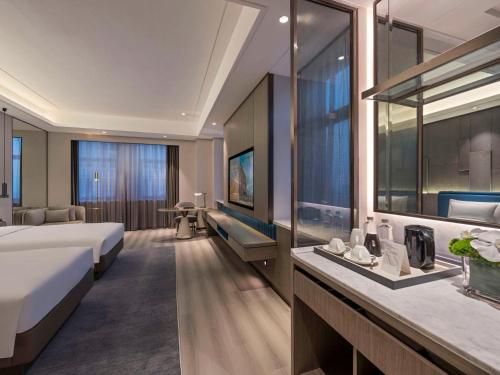 Imagen de la habitación del Hotel Novotel Kunshan Yangcheng Lake. Foto 16