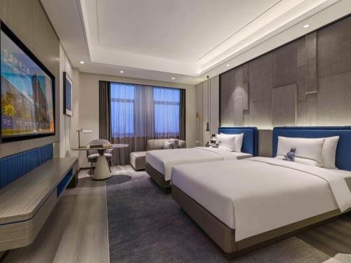 Imagen de la habitación del Hotel Novotel Kunshan Yangcheng Lake. Foto 17