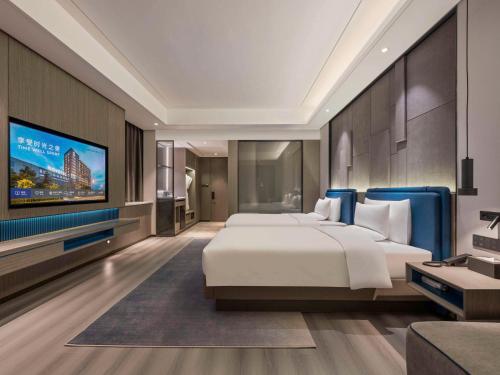 Imagen de la habitación del Hotel Novotel Kunshan Yangcheng Lake. Foto 18