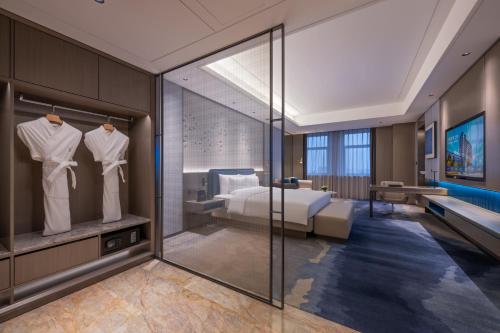 Imagen de la habitación del Hotel Novotel Kunshan Yangcheng Lake. Foto 19