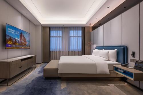 Imagen de la habitación del Hotel Novotel Kunshan Yangcheng Lake. Foto 20