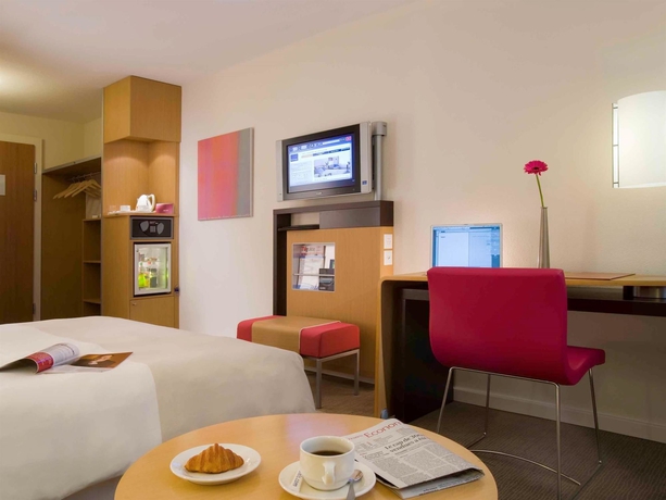 Imagen de la habitación del Hotel Novotel Lausanne Bussigny. Foto 13