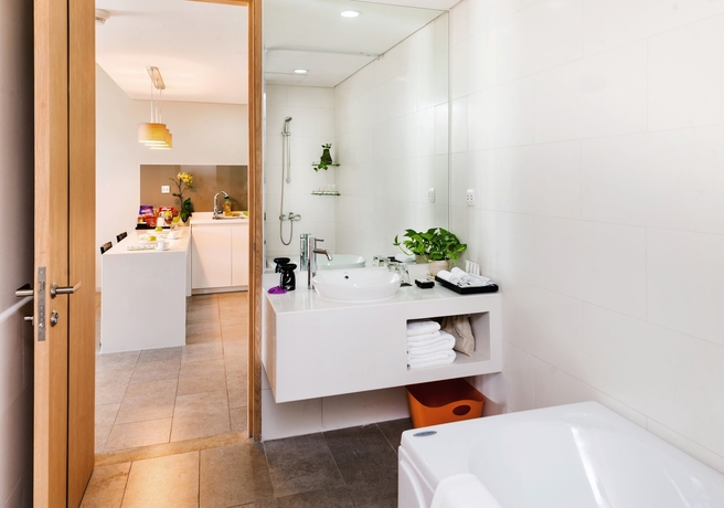 Imagen de la habitación del Hotel Novotel Living Saigon South. Foto 7