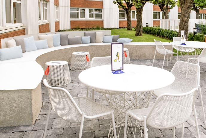 Imagen del bar/restaurante del Hotel Novotel Lyon Bron Eurexpo. Foto 3