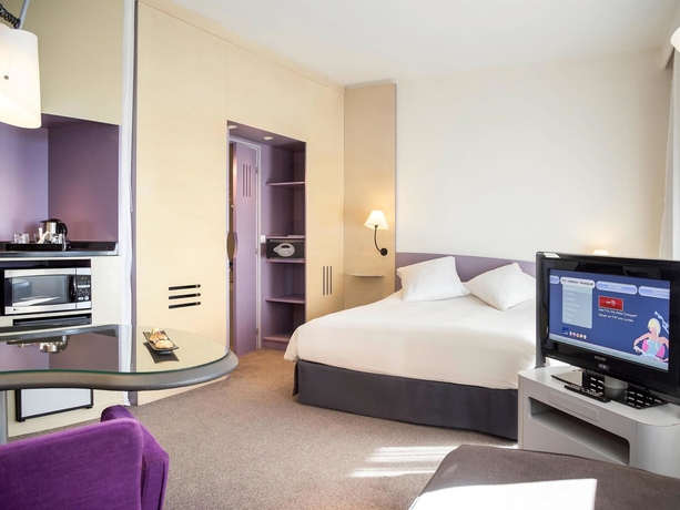 Imagen de la habitación del Hotel Novotel Marrakech Hivernage. Foto 12