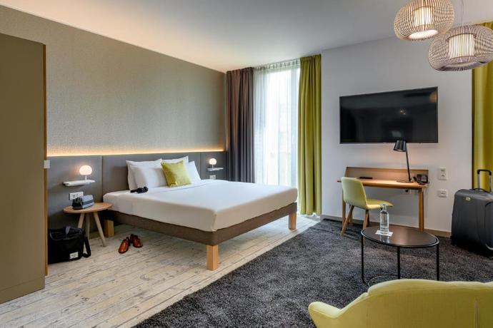 Imagen de la habitación del Hotel Novotel Muenchen Messe. Foto 9