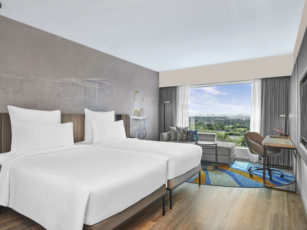 Imagen de la habitación del Hotel Novotel Mumbai International Airport. Foto 14