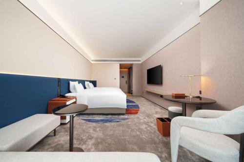 Imagen de la habitación del Hotel Novotel Nanjing Airport. Foto 20