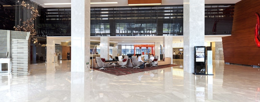 Imagen de los interiores del Hotel Novotel Nanjing East Suning. Foto 18