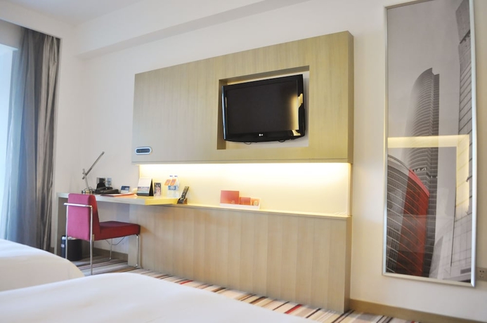 Imagen de la habitación del Hotel Novotel Nanjing East Suning. Foto 13
