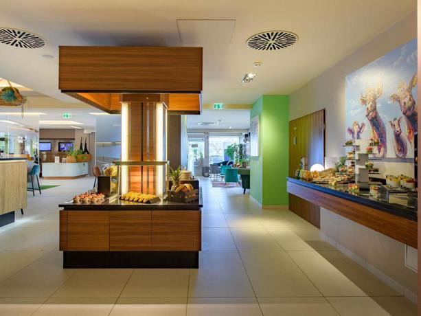 Imagen del bar/restaurante del Hotel Novotel Nuernberg Messezentrum. Foto 3