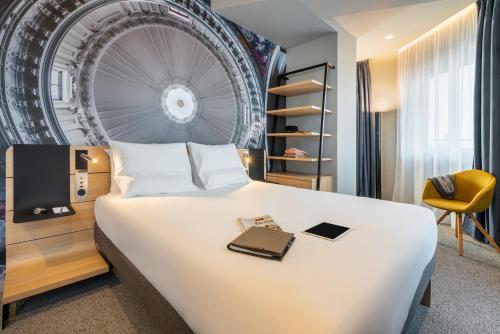 Imagen de la habitación del Hotel Novotel Paris 20 Belleville. Foto 4