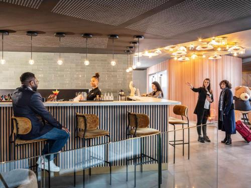 Imagen de los interiores del Hotel Novotel Paris 20 Belleville. Foto 6