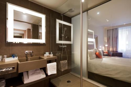 Imagen de la habitación del Hotel Novotel Paris Gare de Lyon. Foto 9