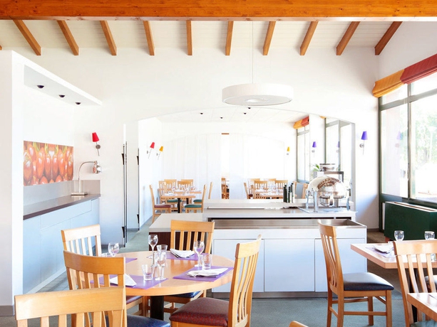 Imagen del bar/restaurante del Hotel Novotel Perpignan Nord Rivesaltes. Foto 2