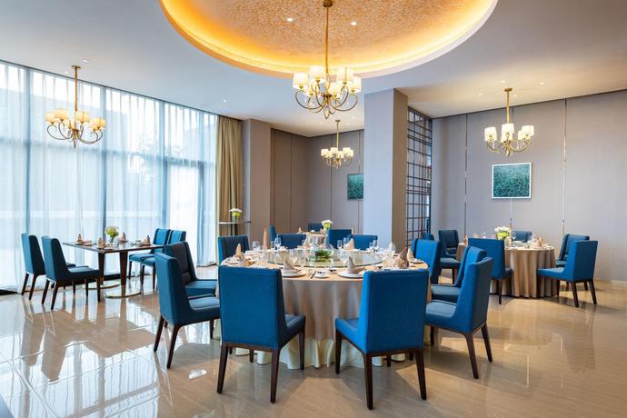 Imagen del bar/restaurante del Hotel Novotel Qingdao New Hope. Foto 4