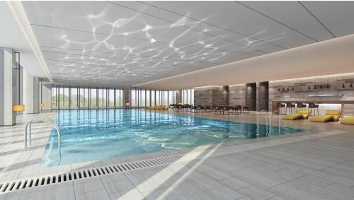 Imagen de la habitación del Hotel Novotel Rizhao Suning. Foto 9