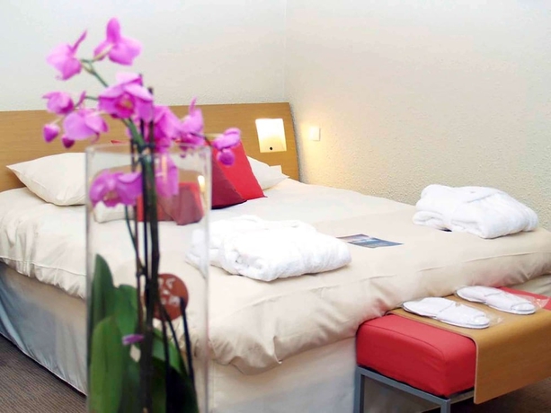 Imagen de la habitación del Hotel Novotel Roissy Saint-Witz. Foto 4