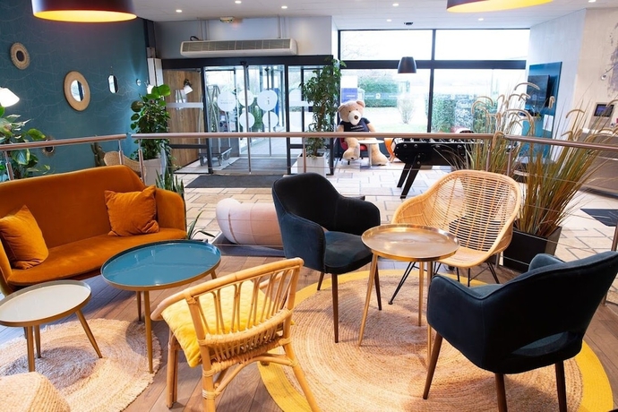 Imagen del bar/restaurante del Hotel Novotel Roissy Saint-Witz. Foto 2