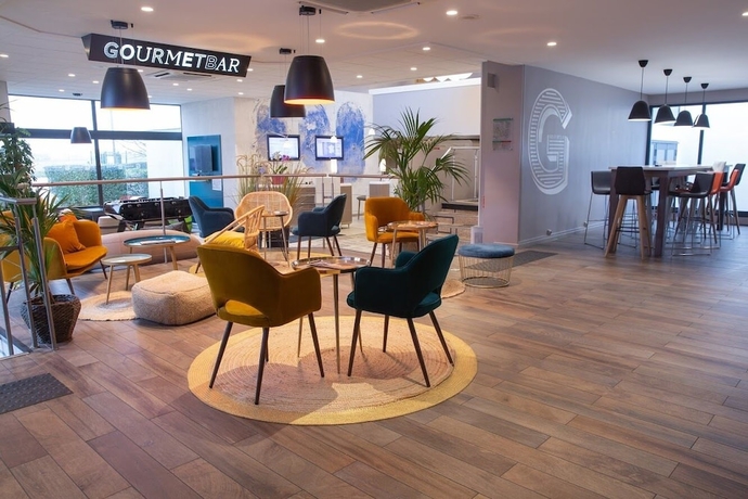 Imagen del bar/restaurante del Hotel Novotel Roissy Saint-Witz. Foto 3