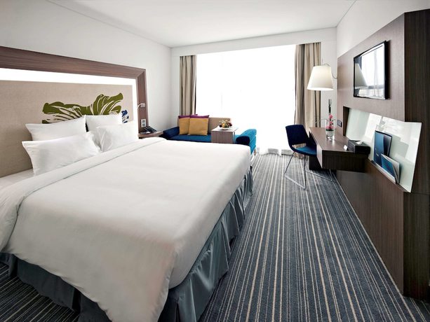Imagen de la habitación del Hotel Novotel Saigon Centre. Foto 14