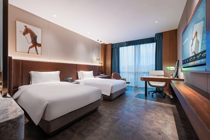 Imagen de la habitación del Hotel Novotel Shanghai Baoshan Jiusi. Foto 3