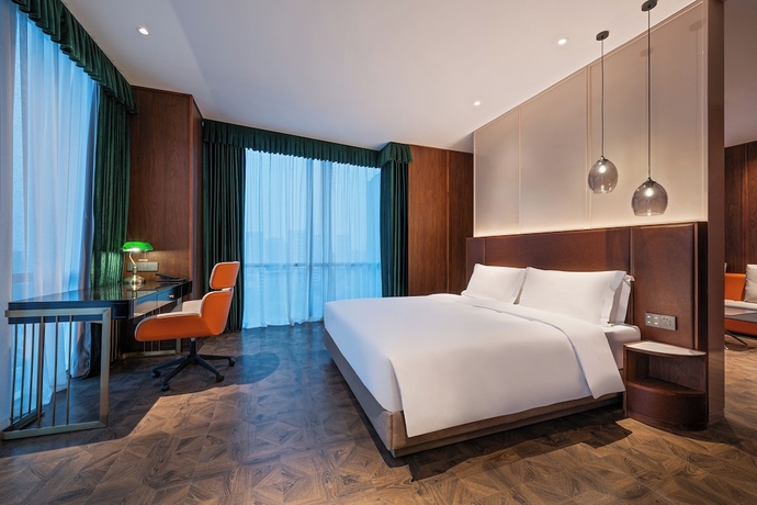 Imagen de la habitación del Hotel Novotel Shanghai Baoshan Jiusi. Foto 4