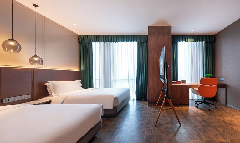 Imagen de la habitación del Hotel Novotel Shanghai Baoshan Jiusi. Foto 6