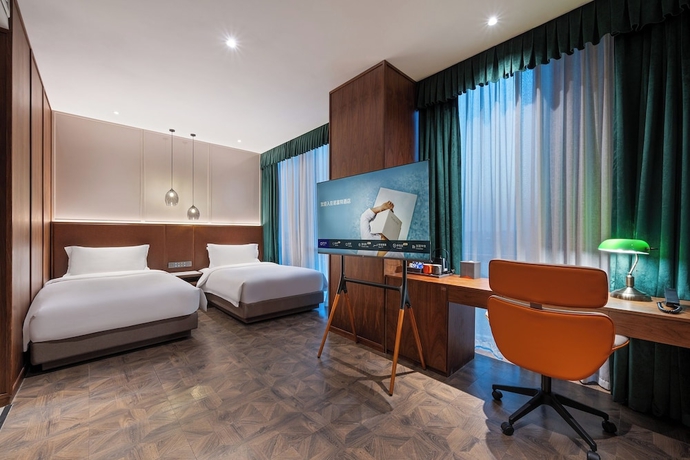 Imagen de la habitación del Hotel Novotel Shanghai Baoshan Jiusi. Foto 7