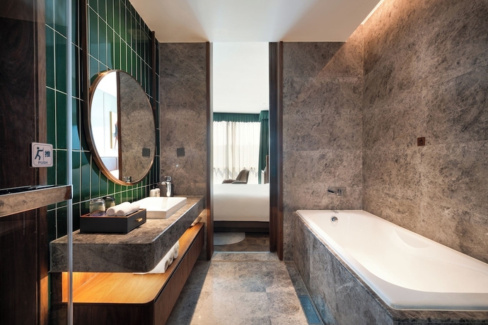 Imagen de la habitación del Hotel Novotel Shanghai Baoshan Jiusi. Foto 8