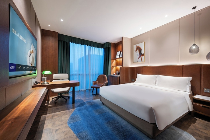Imagen de la habitación del Hotel Novotel Shanghai Baoshan Jiusi. Foto 9