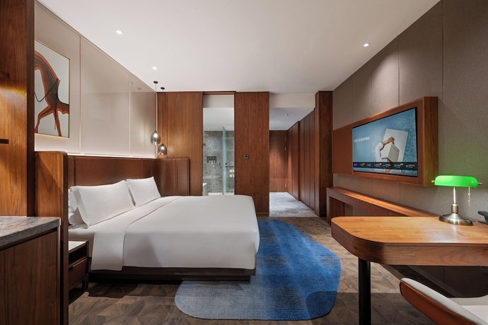 Imagen de la habitación del Hotel Novotel Shanghai Baoshan Jiusi. Foto 10