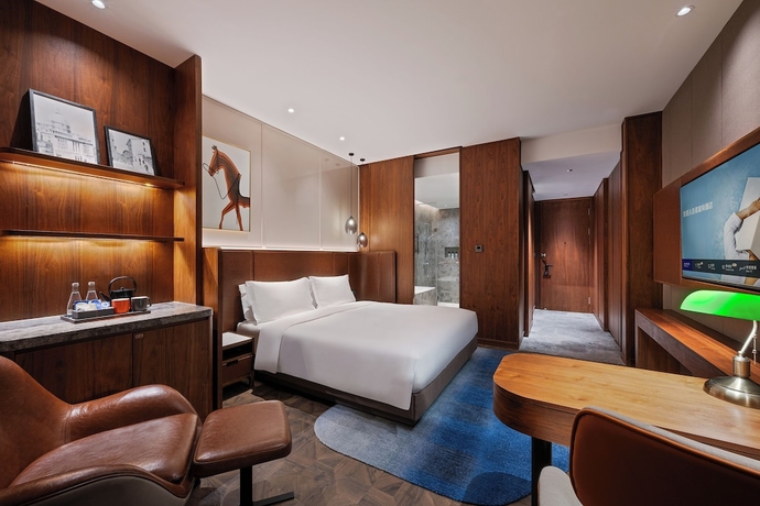 Imagen de la habitación del Hotel Novotel Shanghai Baoshan Jiusi. Foto 11