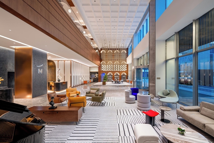 Imagen de los interiores del Hotel Novotel Shanghai Baoshan Jiusi. Foto 13