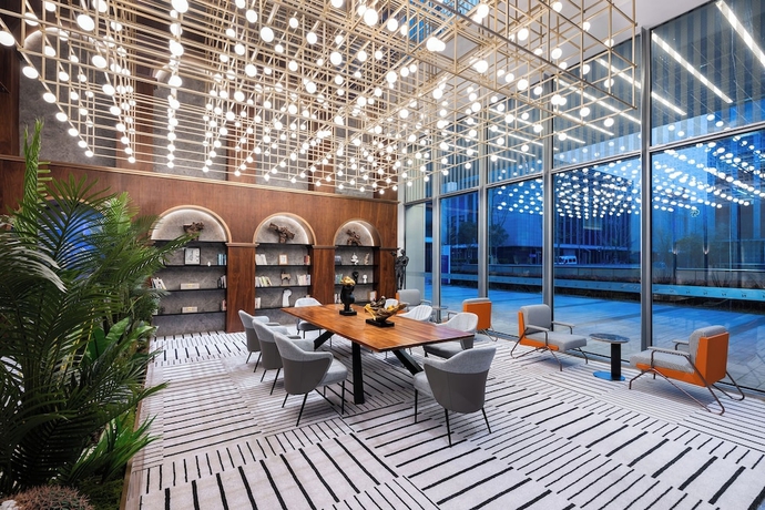 Imagen de los interiores del Hotel Novotel Shanghai Baoshan Jiusi. Foto 14