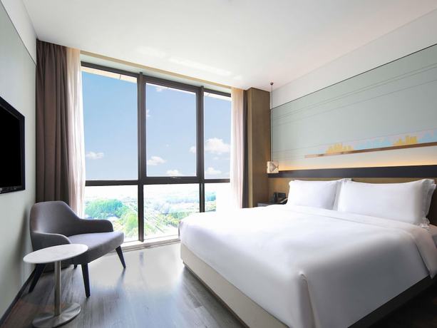 Imagen de la habitación del Hotel Novotel Shanghai Chuansha. Foto 2