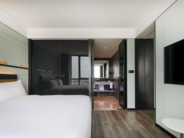 Imagen de la habitación del Hotel Novotel Shanghai Chuansha. Foto 5