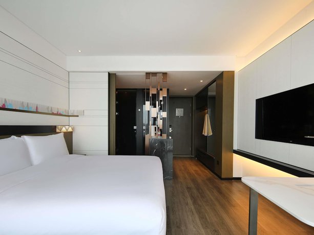 Imagen de la habitación del Hotel Novotel Shanghai Chuansha. Foto 7