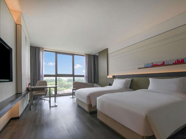 Imagen de la habitación del Hotel Novotel Shanghai Chuansha. Foto 8