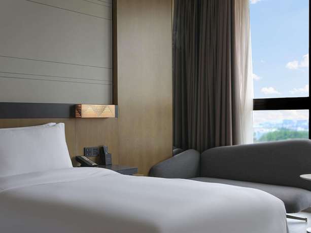 Imagen de la habitación del Hotel Novotel Shanghai Chuansha. Foto 9