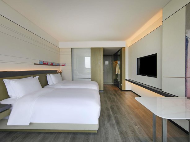 Imagen de la habitación del Hotel Novotel Shanghai Chuansha. Foto 10